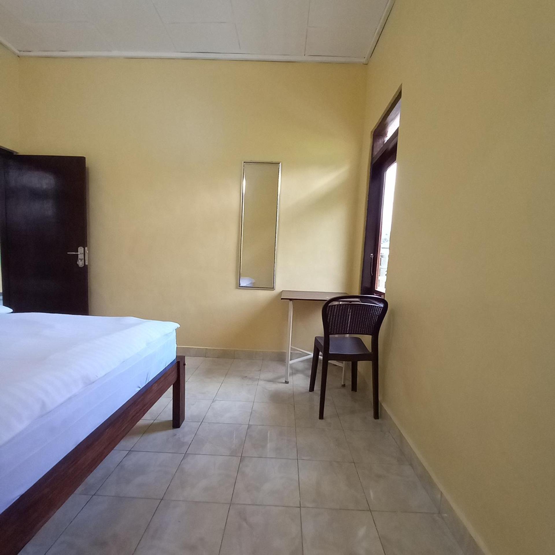 Tange Guest House Ruteng Quarto foto